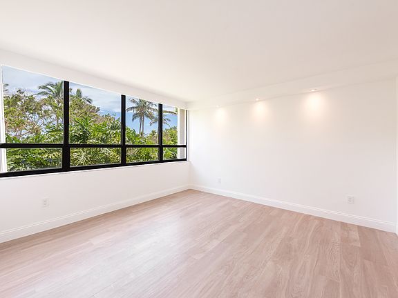 5th image of 1 Grove Isle Dr APT 203