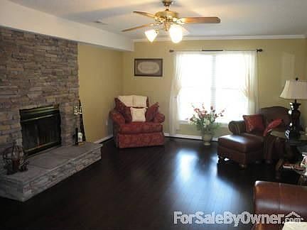 Living Room
						:
						Very Large 13x23 living room with rock faced wood buring fire place.