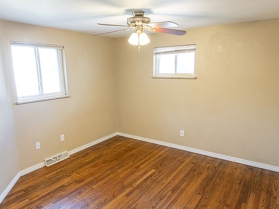 Bedroom 1 with adjoining bathroom and walk-in closet