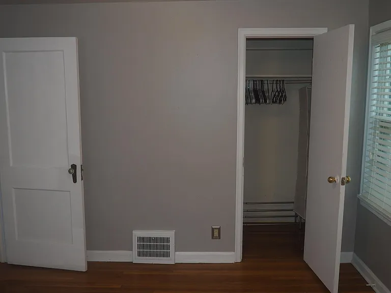 One of the two master bedroom closets.
