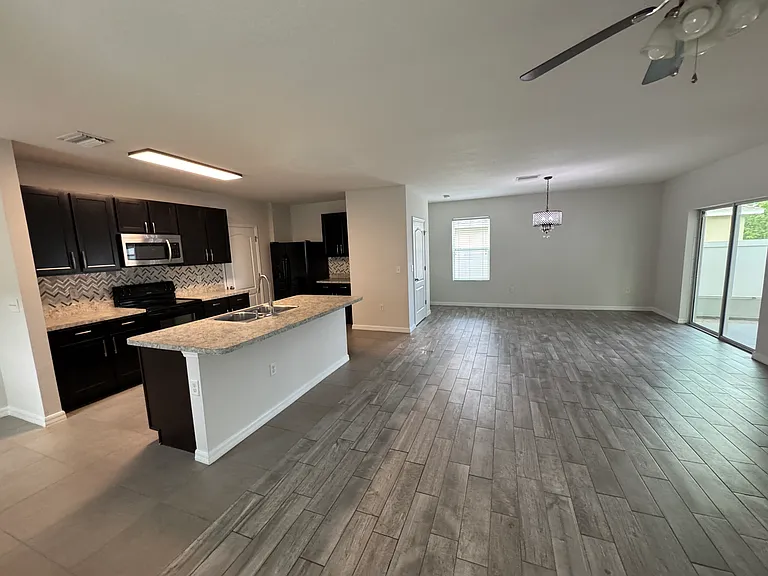 12034 Suburban Sunrise St — Photo 4
