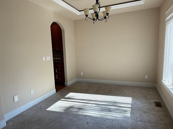 the dinning room with kitchen on the left//1st floor