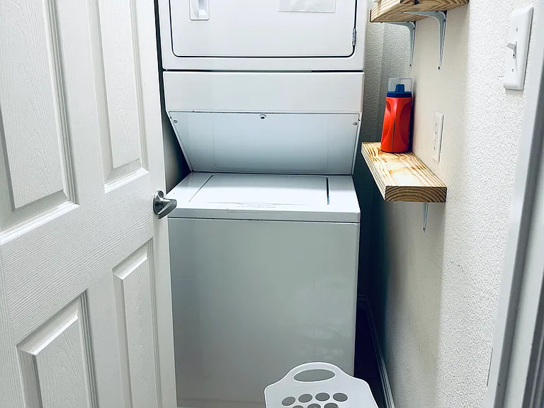 Seperate laundry room.