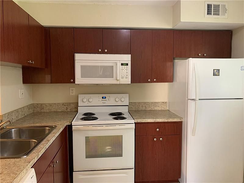 1st image of 112 Gardens Dr APT 103