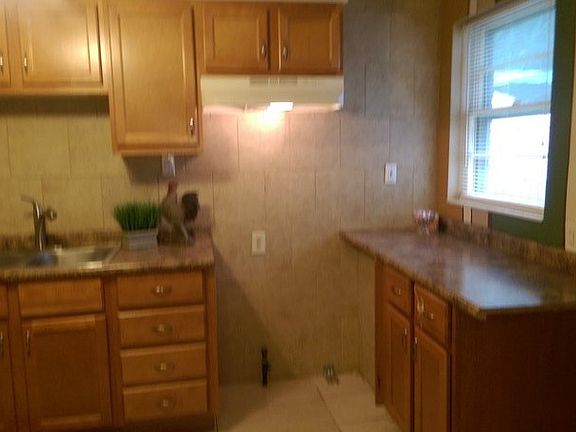 Kitchen 13 ft 10 1/2 in X 9 ft 4 in