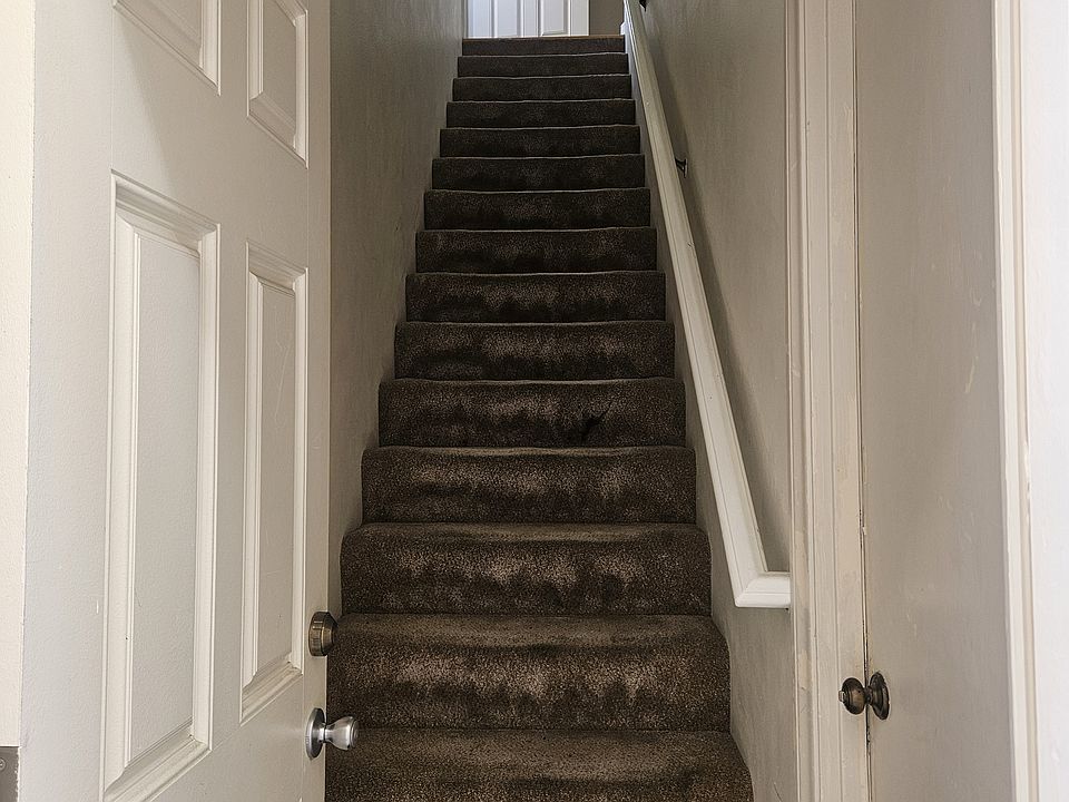 Private entrance door and stairway to apartment/Granny unit