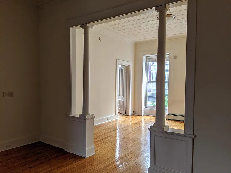 view of front room, door to bedroom
