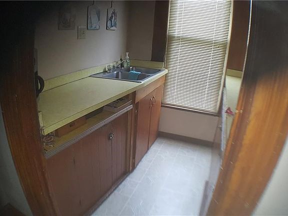Galley kitchen showing sink.
