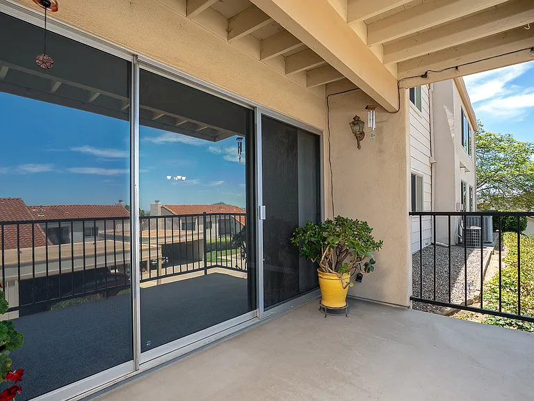 Private, covered, patio/balcony to enjoy your morning coffee or vibrant sunsets just to your left.