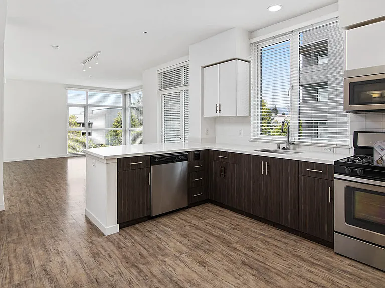 Kitchen with Quartz Countertops and Stainless Steel Appliances