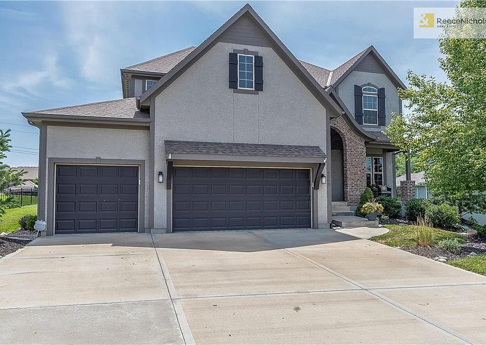 Brick & Stucco Rustic Elegance Style, All sides are Professionally Landscaped and a Cozy Front Porch