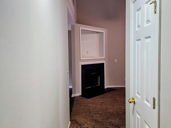 Hall from primary bedroom to family room.