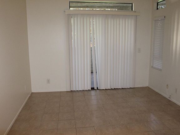 Family room w/sliding glass door to the balcony.