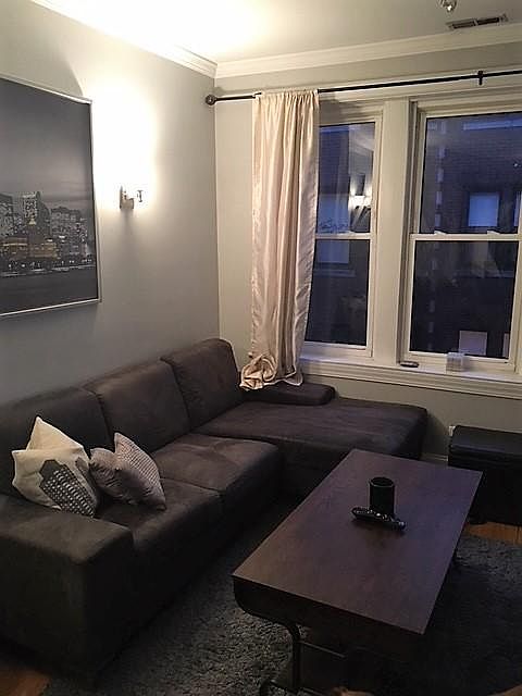 Living Room:  Oversized windows, Tall Ceilings, Courtyard 
