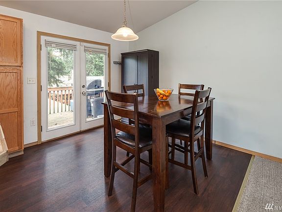 Dining room has French doors leading to back deck