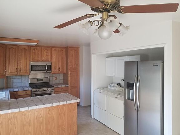 Stainless steel fridge and washer dryer