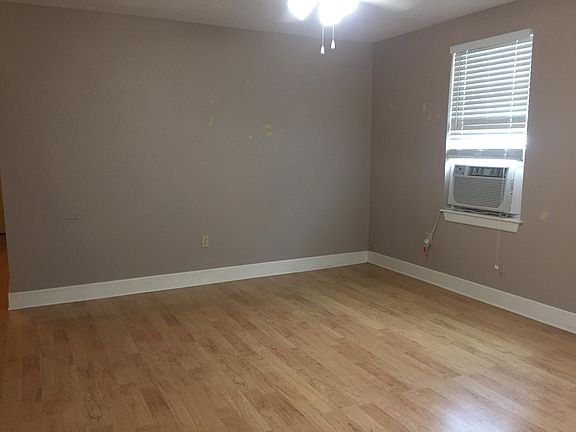 Living Room Unfurnished Photo. Window Unit no longer part of unit. Central A/C and Heat has been installed
