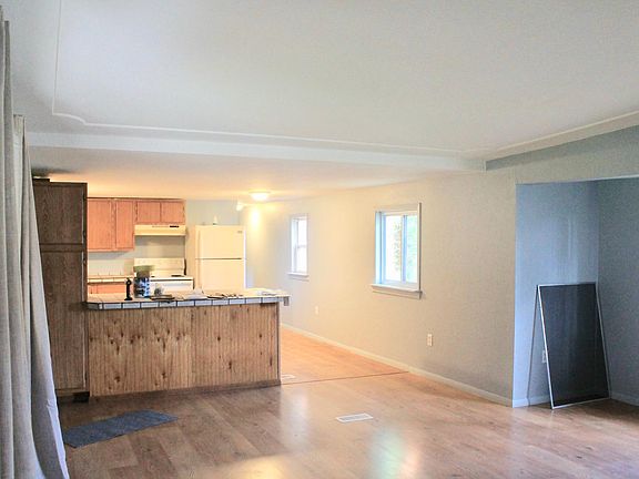 Large living room opens to kitchen and front bedroom