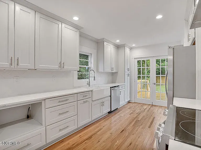 *original listing photo from when we purchased the home (kitchen)
