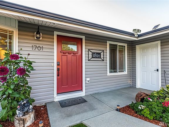 This stylish front door highlights the welcoming entry.