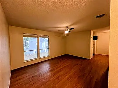 Facing living room from apartment entrance