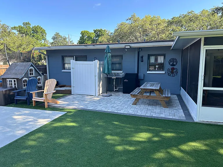 Patio with outdoor shower, grill and sink