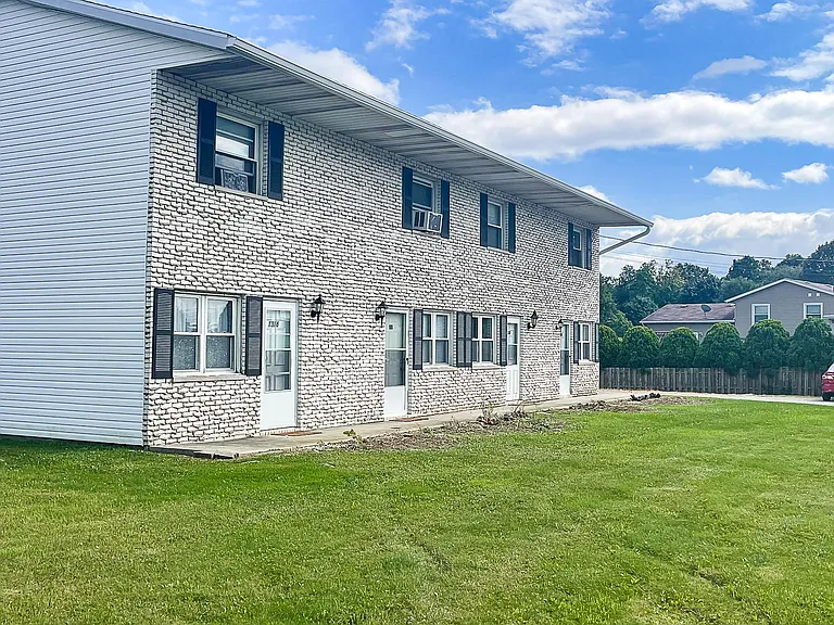 1312 Spring Village Dr — Photo 1