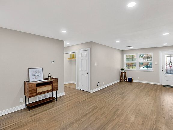 The entry sets the tone: clean lines, fresh flooring, and natural light that instantly makes the space feel open and easy. It's the kind of layout that welcomes you home without saying a word.