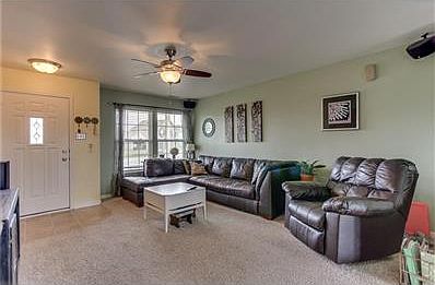 Welcome to the family room. Spacious and tastefully decorated