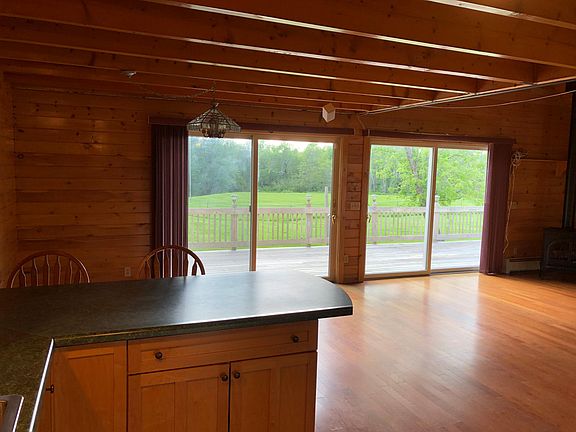 Kitchen looking into living room
