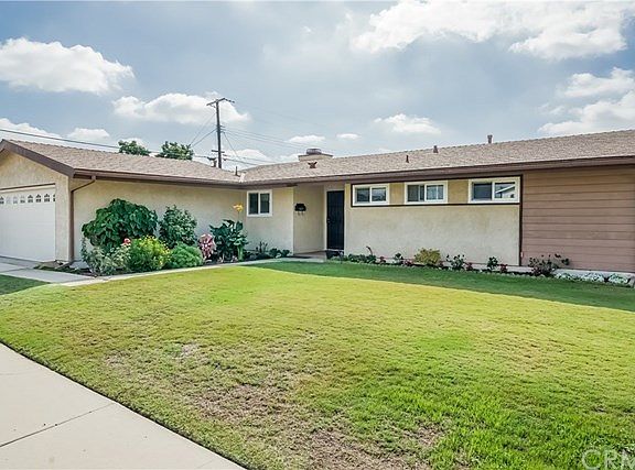 Corner lot location with spacious front yard and large back yard