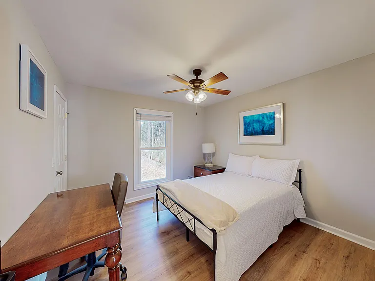 Bedroom with desk area
