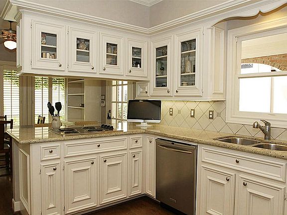 Updated kitchen with granite counters and stainless appliances.