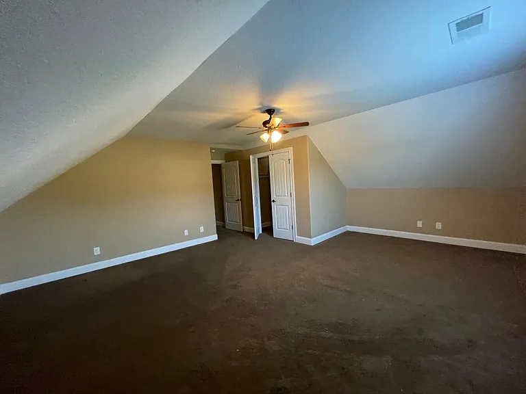 Expansive upstairs bedroom, previously used a bonus space now with added walk in closet for plenty of storage.