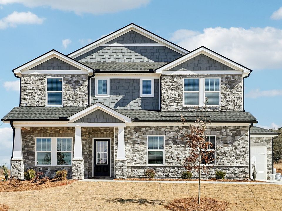 The Johnson floorplan with Elevation K modeled at River Pointe.