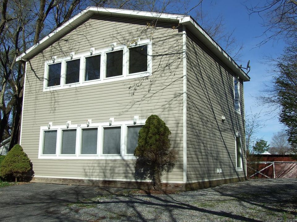 This is the street side of the apartment building. There is a 200-foot driveway leading to the street.
