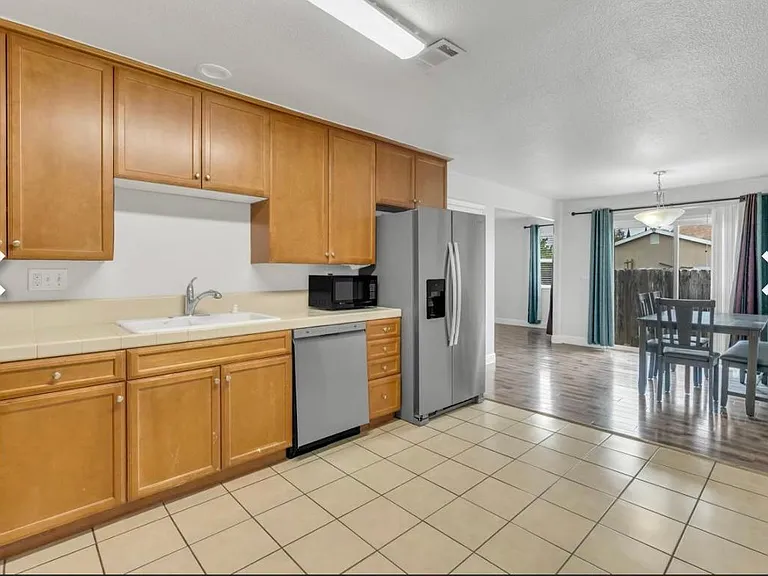 Kitchen and dining area of 3199 Western Avenue Sacramento, CA 95838