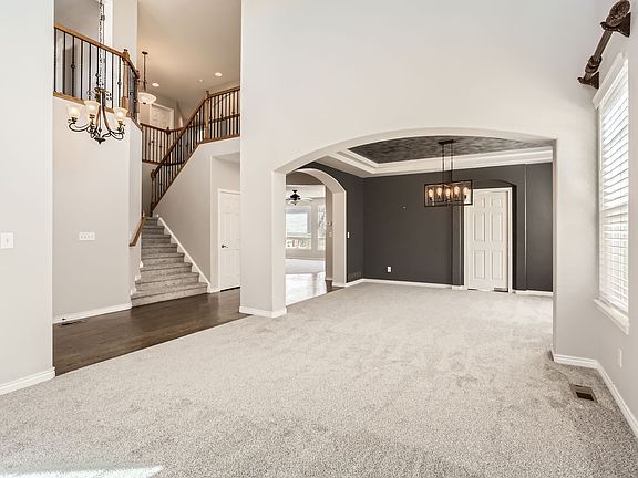 Front entry, formal living room looking into formal dining room.