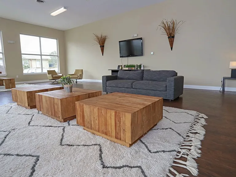 Comfortable clubhouse with contemporary furnishings, perfect for relaxing or social gatherings.