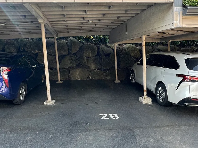 Covered carport next to unit