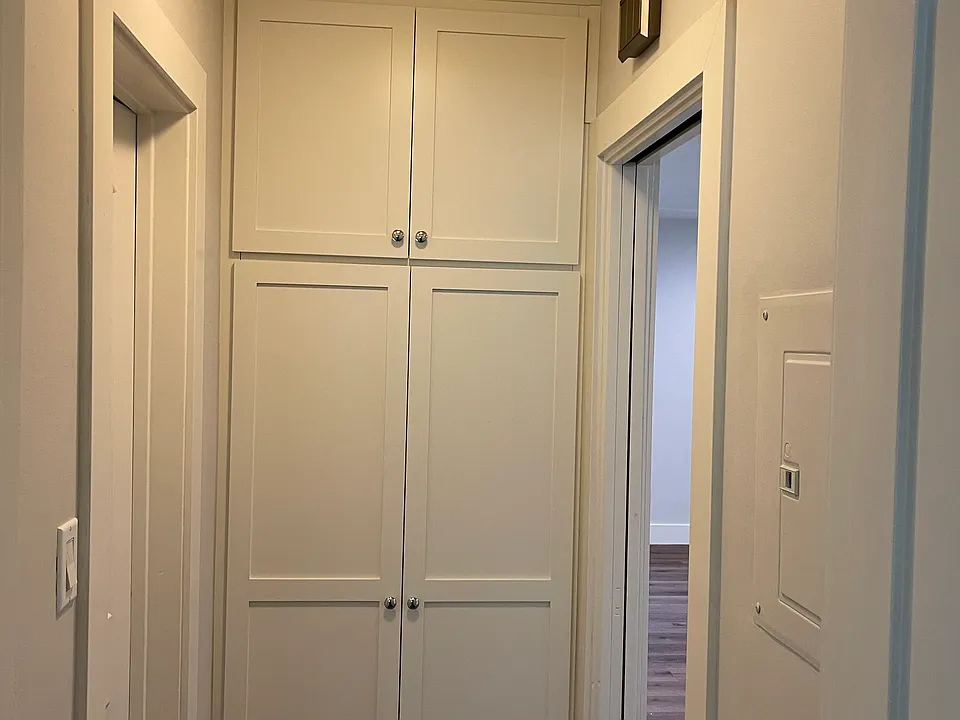 10716 large hall with full linen cabinets