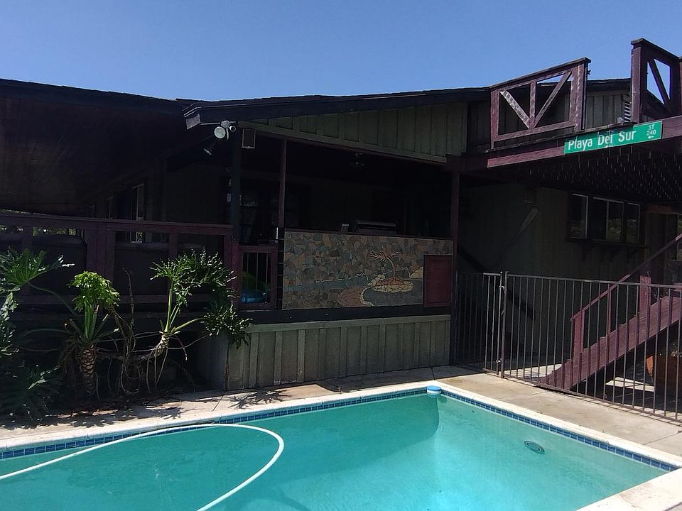 Beautiful 4 bed ,4 bath country home on a shared 3.5 acers. This is the pool deck, spa is located upstairs on the upper deck