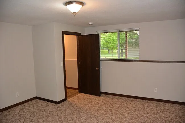 Bedroom #3 egress window overlooking back yard