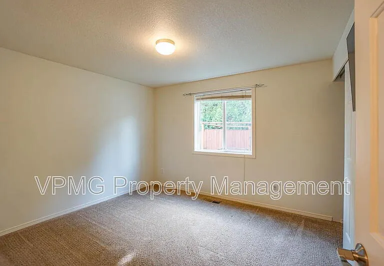 8620 NE 90th Pl — Photo 25