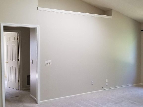 living room looking towards guest bath and bedrooms