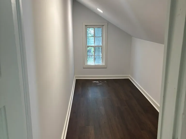 Huge closet off primary bedroom - Large enough for a wardrobe and a desk.