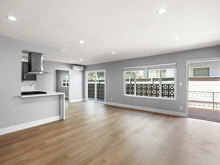 Open-Concept Kitchen, Dining, and Living Room Spaces
