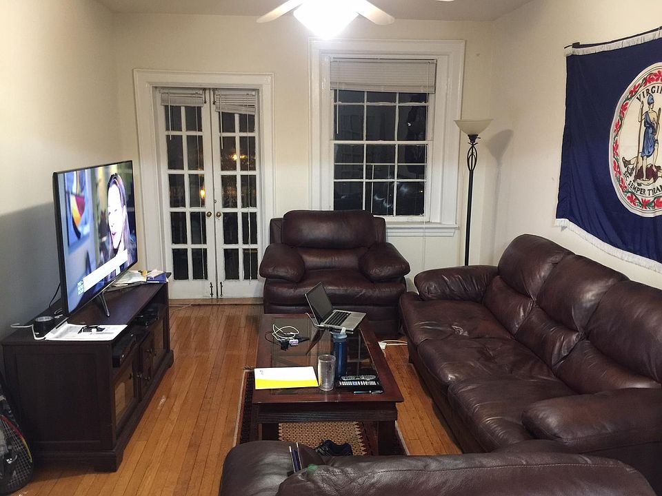 Living room (glass doors open out to balcony.