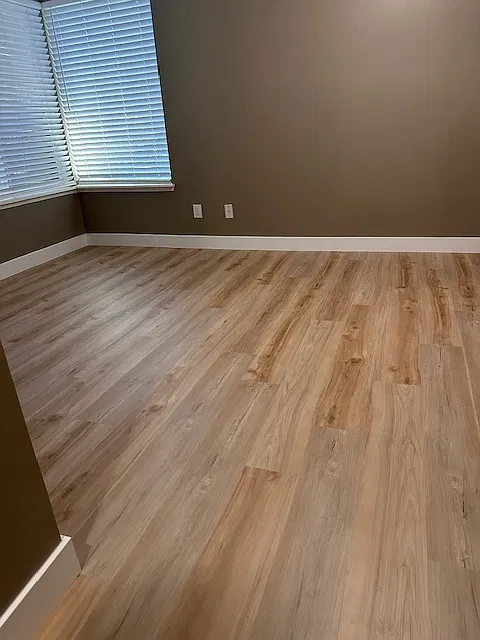 New hardwood flooring throughout unit.