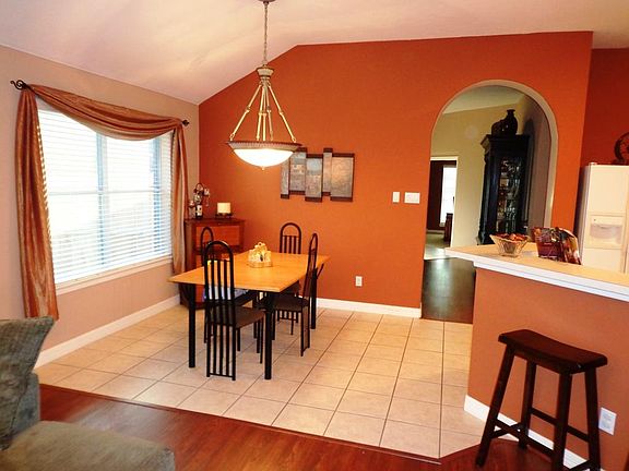 Another view of breakfast area notice arched doorways